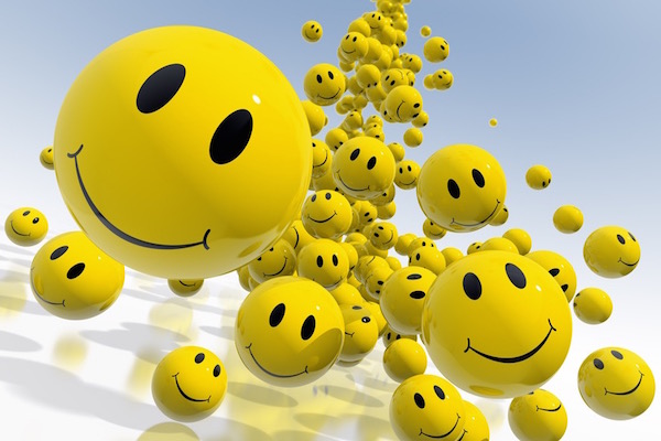 Citromsárga smiley-k özönlenek felénk a képernyőről, a mosolyjelek a pozitív gondolkodásra utalnak.